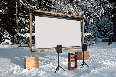 Timberline Free-Standing Screen Frame and Wired Outdoor Movie Theater setup in the winter.